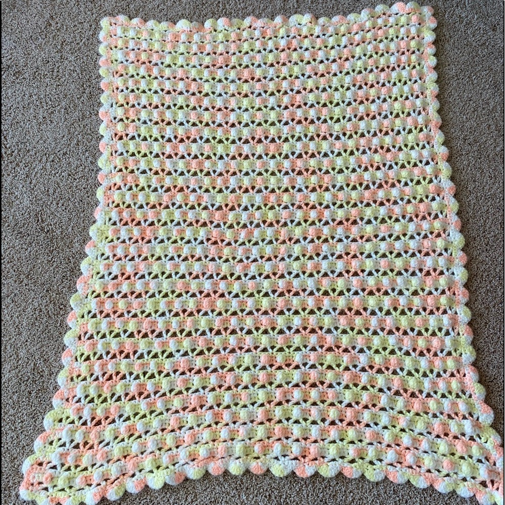 Vintage baby size crocheted afghan